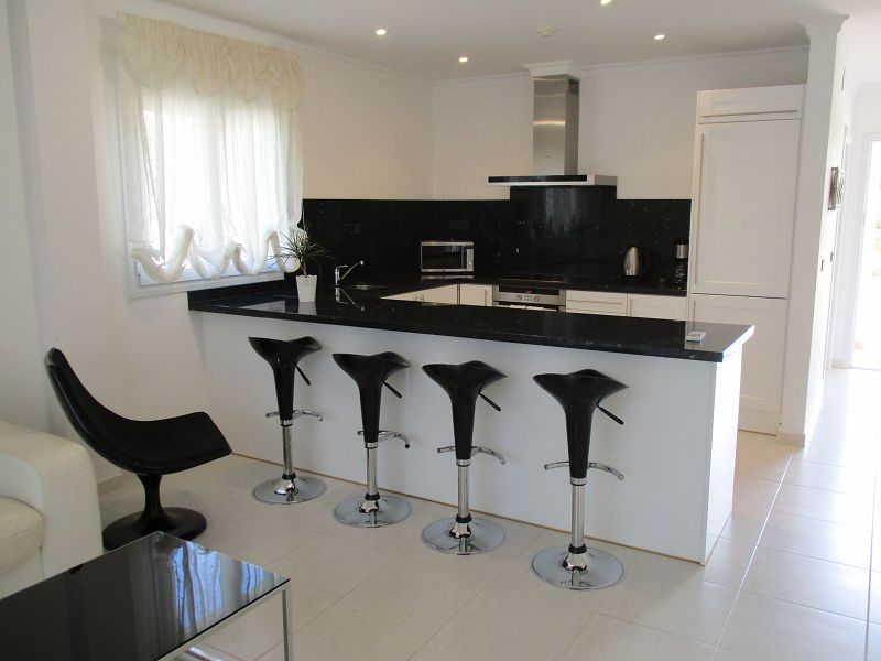 Wohnung in Benissa kaufen in einem Luxus Resort direkt am Meer 215.000 €